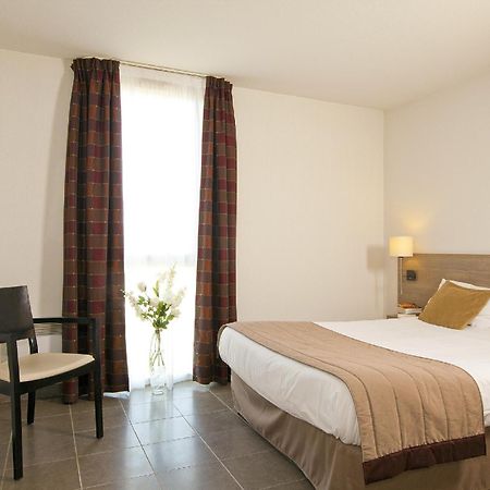 Apparthotel Sejours & Affaires Manosque Quarto foto